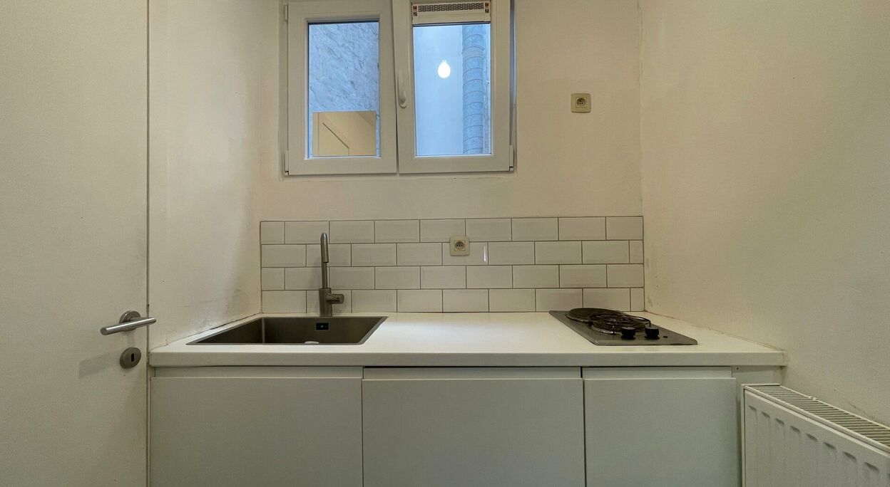 Woning met handelsruimte en 3 appartementen te koop in Gent